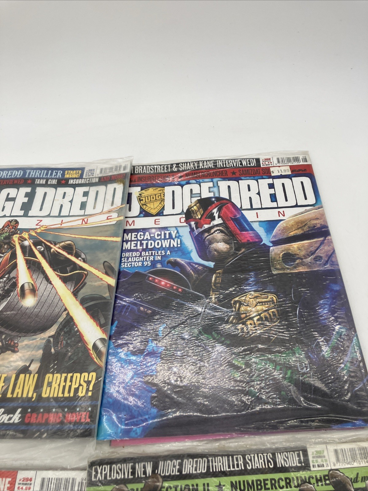 Lot of 4 Judge Dredd Megazine All new and sealed Ships Fast